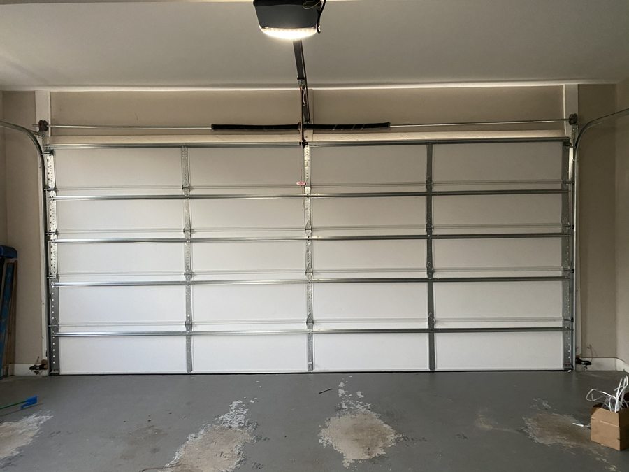 Newly installed garage door after replacement in Peachtree Corners, GA