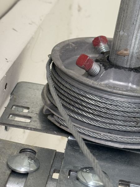 Frayed garage door cable repair and replacement