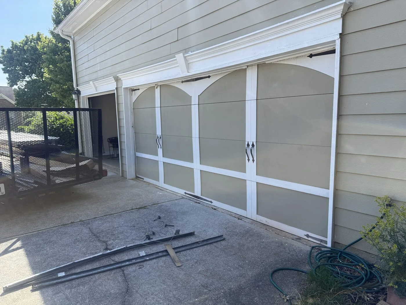Garage door back in its tracks with damaged track removed, Peachtree Corners GA