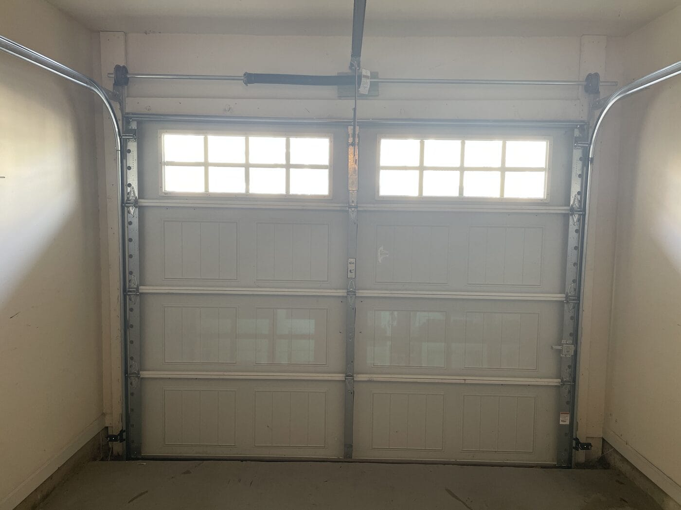 New torsion spring system mounted above the door opening, Woodstock GA