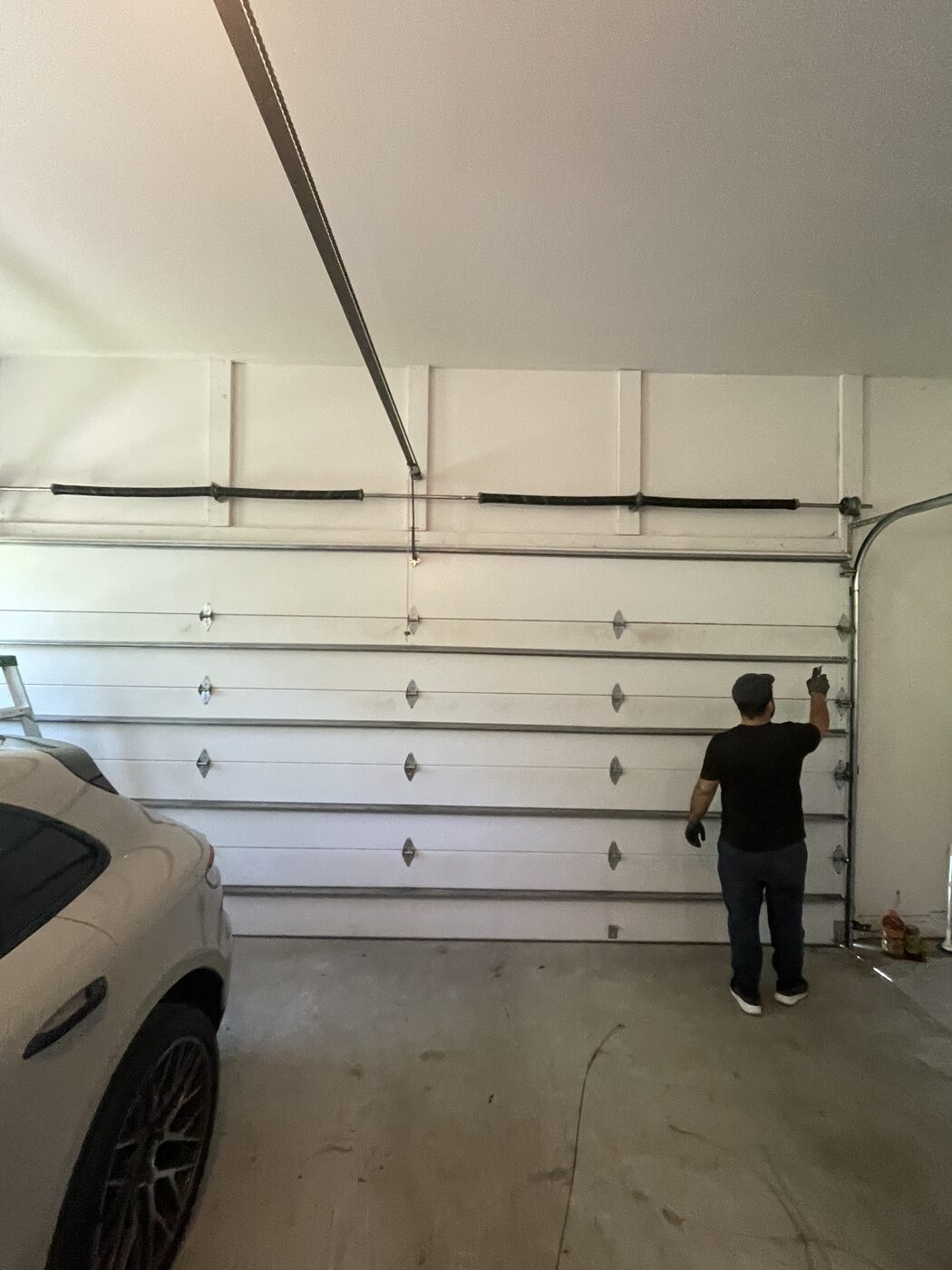 New high-cycle torsion springs installed and door rebalanced, Suwanee GA