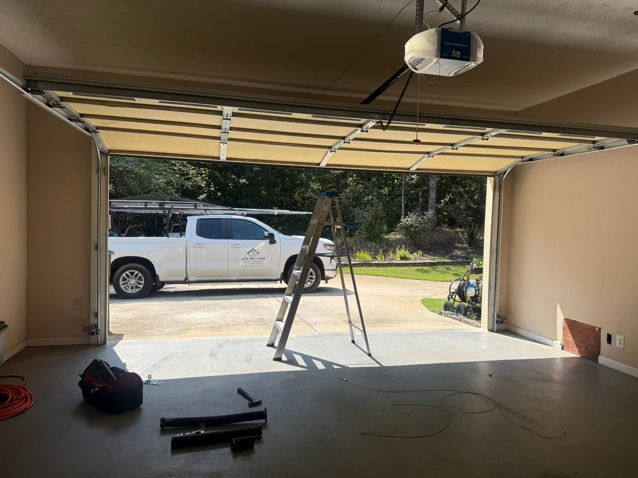 New torsion springs fitted and garage door working again in Alpharetta GA