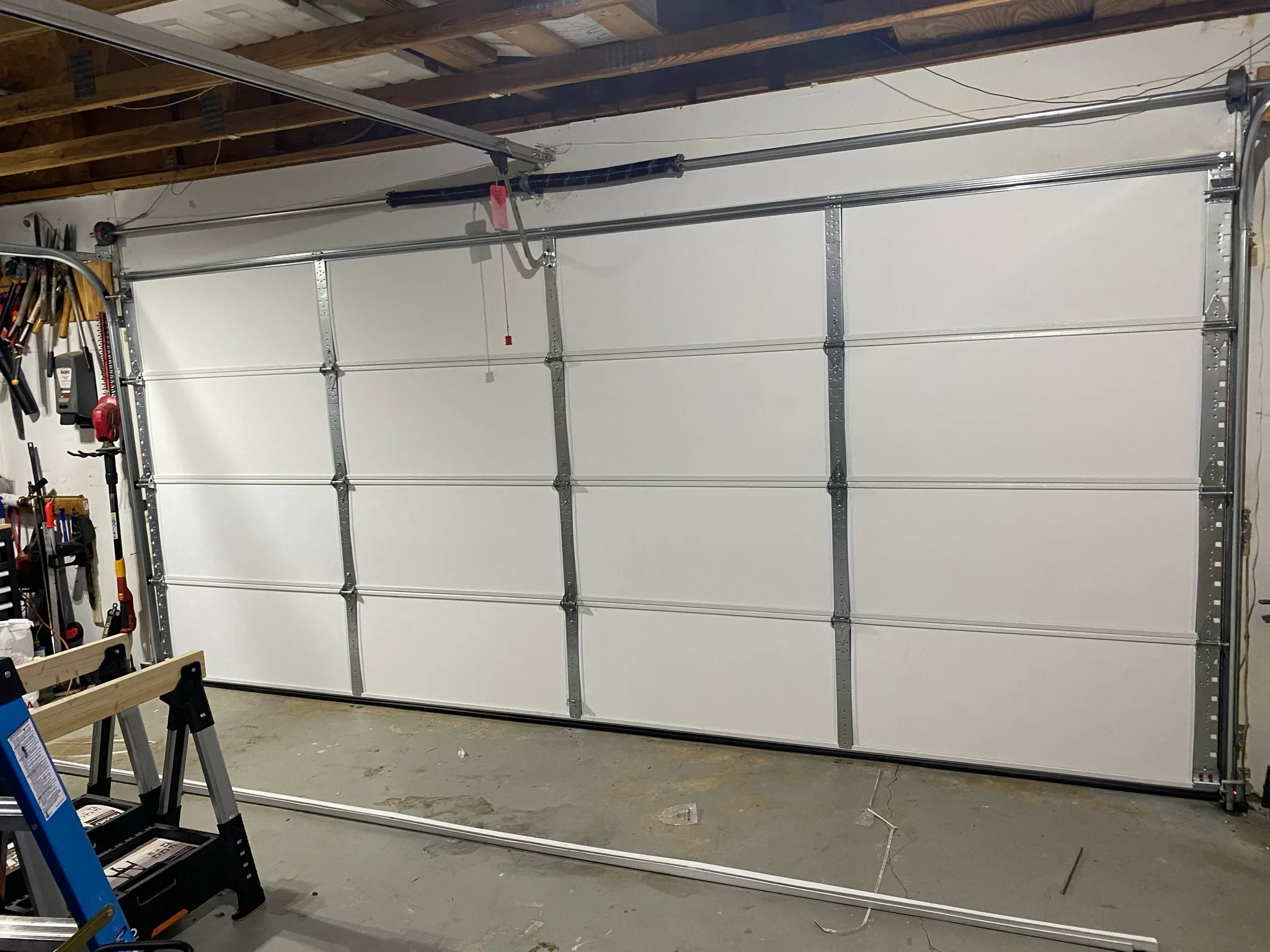 New insulated steel garage door installed in Avalon, Alpharetta GA