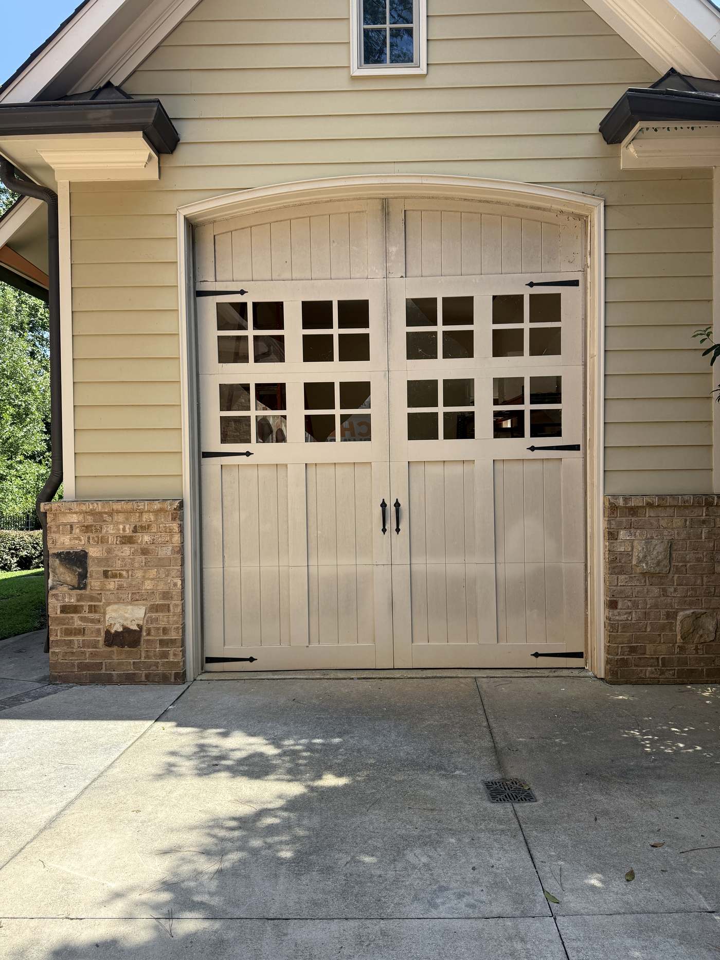 Repaired carriage-style garage door back on track in Buckhead, Atlanta GA